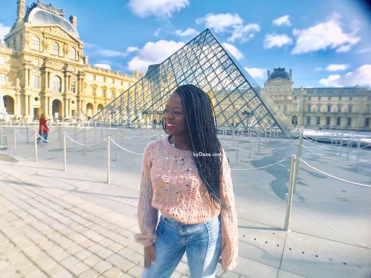 a picture in front of the Louvre pyramid in Paris