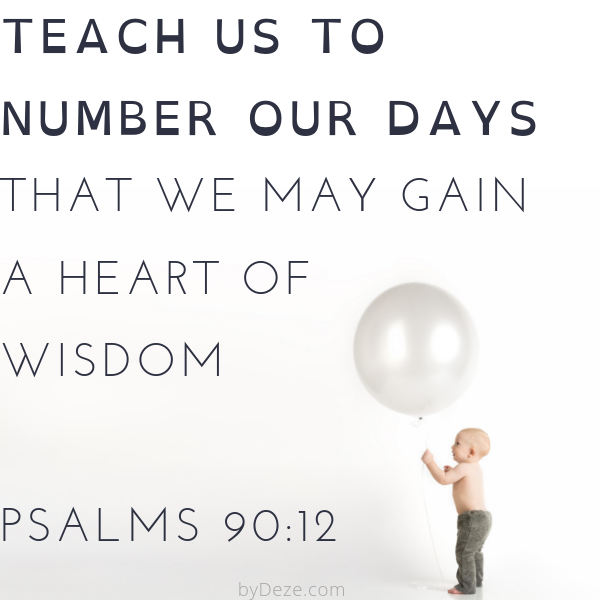 teach us to number our days with a picture of a baby holding a ballooon - birthday bible verse from psalms 90:12
