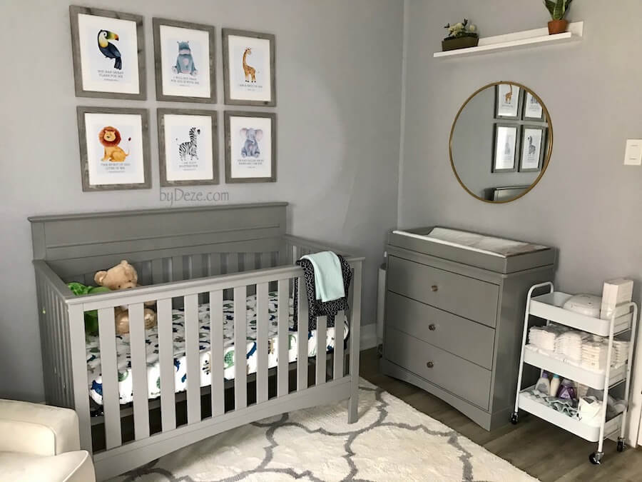 small, gender neutral nursery with crib, changing table and mirror