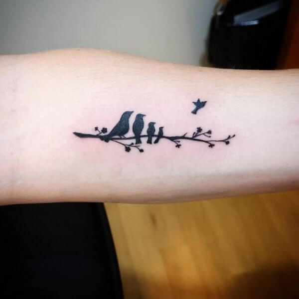 bird leaving the nest lost pregnancy tattoo in black ink