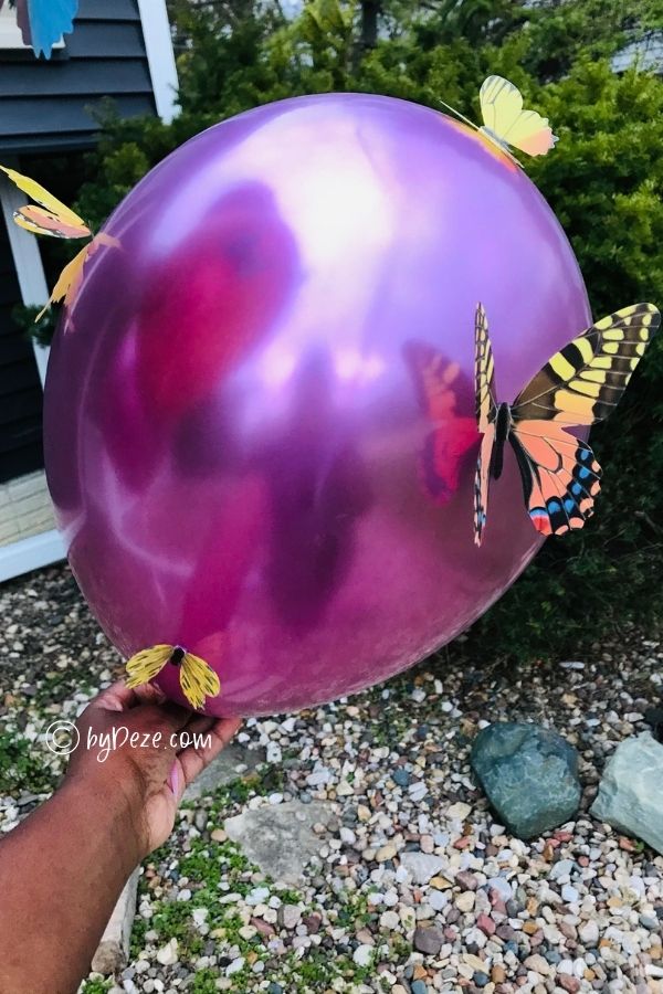 close up diy balloon craft with butterflies