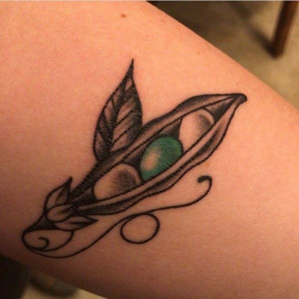 green pea in the middle of the pod tattoo by @joykvan instagram